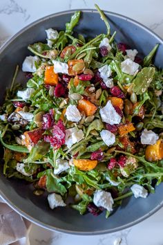 You have to try my roasted butternut squash and goat cheese salad. It is hearty and delicious, with sweetness from the roasted butternut squash, tang goat cheese dried cranberries, and a homemade honey balsamic dressing. #butternutsquash #goatcheese #christmassalad #christmasrecipes #dinner #dinnerrecipe #vegetarian