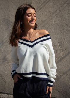 Perfectly preppy! This simple but stunning sweater has a navy varsity stripe that we're all obsessed with right now. You can wear it off shoulder or as the classic v. both are stunning! Comes in ivory & navy. Tennis Sweater, Wear It, Sweater Top, Sweaters & Cardigans, Off Shoulder, Right Now, Shopping Outfit, Tennis, Navy