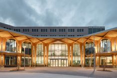 a large building with many windows and lights