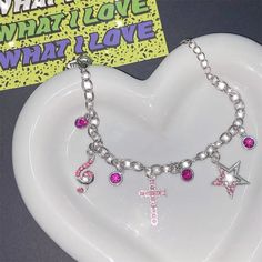 𝔇𝔢𝔱𝔞𝔦𝔩𝔰 Style: E-girl, Y2K, Pastel Goth, Kawaii Goth Materials: Metal & Rhinestone Quantity: 1 pc This is a super cute & dark bracelet featured with our shinning pink pendants Solid & lightweight, It can perfectly match your kawaii goth outfits Enjoy free shipping with a purchase of over 80$ Trendy Alloy Charm Bracelet For Party, Silver Alloy Charm Bracelet For Party, Pink Punk Jewelry For Party, Cute Silver Charm Bracelet For Party, Punk Silver Jewelry For Valentine's Day, Silver Punk Jewelry For Valentine's Day, Silver Harajuku Jewelry For Party, Silver Harajuku Style Party Jewelry, Valentine's Day Punk Silver Jewelry