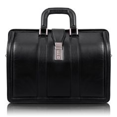 Sophisticated design with secure 3-digit combination lock briefcase. Organizer with storage space for media devices, cell phone, business cards and pens. 3-section construction with padded middle section that protects laptops up to 17 in. size and 2-divider sections for documents. Removable, non-slip, shock absorbing neoprene shoulder strap stretches for comfort alleviating body strain. Color: Black. Vintage Laptop Bag, Morgan Brown, Vintage Briefcase, 17 Black, Laptop Briefcase, Business Essentials, The Morgan, Briefcase For Men, Combination Locks