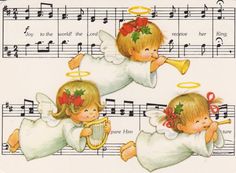 two little angels playing music on sheet music