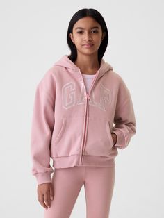 Supersoft cotton-blend, sherpa-lined hoodie.  Hooded neckline.  Long sleeves.  Zipper closure.  Kanga pocket.  Banded hem.  Sherpa lining.  Embroidered Gap arch logo at front.  Relaxed, easy fit.  Hits at the hip.