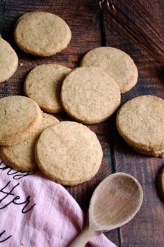 some cookies and a wooden spoon on a table