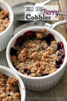 three small white bowls filled with blueberry cobbler