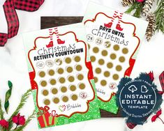 two christmas activity coupons on a table