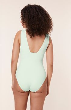 This plunging one-piece is made for soaking up the sun in comfort with wide straps for extra support. Elasticized straps   Moderate back coverage   Lined, with removable soft cups   80% recycled nylon, 20% spandex   Hand wash, dry flat   Imported Beach Swimwear With Moderate Back Coverage And Wide Straps, Summer Bodysuit With Lined Body And Closed Back, Wide Straps Swimwear For Summer Vacation, Spring Low Back Swimwear, Solid Swimwear With Wide Straps For Pool, Green Bodysuit For Sunbathing In Spring, Pool Swimwear With Wide Straps, Green Bodysuit For Spring Sunbathing, Green Triangle Top Bodysuit For Poolside