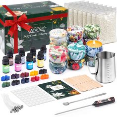 an assortment of crafting supplies including candles, glues and other items for making gifts