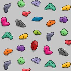 a group of different colored objects on a gray background