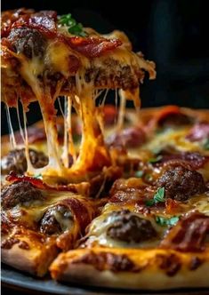 a close up of a pizza on a pan with cheese and meat toppings being lifted from it