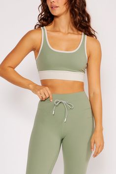 Cream Yoga - Blake contrast binding sports bra black Green Moisture-wicking Micro-elastic Sports Bra, Green Compression Sports Bra For Pilates, Green Compressive Sports Bra For Light Sports, Sportswear Activewear With Contrast Trim, Sporty Gym Activewear With Contrast Trim, Sports Activewear With Contrast Trim, Green Sporty Activewear Bra Friendly, Green Seamless Sports Bra For Light Sports, Athleisure Activewear With Contrast Trim For Gym