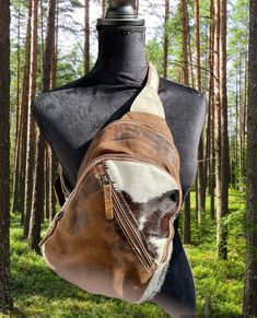 Looking for a convenient and stylish way to carry your essentials?  Look no further than our Cow-girl/Equestrian sling bag! These are worn over one shoulder, with a strap that goes across your chest or back for easy access and comfortable carrying. Whether you're riding a horse, hiking, biking, or just running errands, a sling bag is the perfect choice for keeping your wallet, phone, and keys close at hand without weighing you down and giving you a hands-free convenience.  We need to emphasize t Outdoor Satchel Bag With Zipper Closure, Outdoor Shoulder Bag With Zipper Closure, Outdoor Satchel Bag With Adjustable Strap, Brown Shoulder Chest Bag With Zipper Pocket, Outdoor Satchel Chest Bag With Zipper, Outdoor Brown Shoulder Bag With Zipper Closure, Brown Outdoor Shoulder Bag With Zipper Closure, Outdoor Satchel Chest Bag With Zipper Closure, Casual Satchel Chest Bag With Single Strap