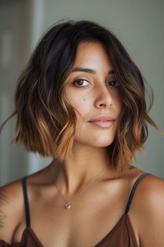 Make a bold fashion statement with a trendy undercut bob in sunkissed brunette, finished with a soft caramel ombre. This hairstyle merges the daring edge of an undercut with the warm, inviting tones of caramel ombre, creating a look that’s both striking and sophisticated. Perfect for those looking to stand out, it’s a testament to the power of contrast and creativity in hair styling. Short Bob Brunette Balayage, Short Bob Black Hair With Highlights, Brunette With Auburn Highlights Caramel, Brunette Bob Highlights, Ombre Hair Brown To Caramel, Ombre Bob Brunette, Ombre Medium Length Hair, Dark Brown Hair Bob, Ombre Hair Caramel