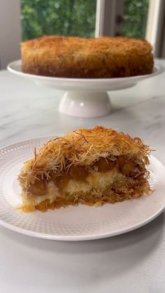 a piece of cake sitting on top of a white plate