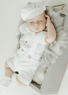 NEW! Here is a set that every parent will love ❤️  It must be a perfect day 🕊️✝️ Baby boy white linen suit  Made of the highest quality material. With attention to every detail ----------- Standard Outfit ( linen shirt- body, linen pants, linen bow tie ) ------   * linen shirt-body. Beautiful, white, classic. Short sleeve. Fastened with wooden buttons. Extremely soft and delicate * linen white shorts with suspenders  Our bestseller and must have this season spring-summer 2024 Finished and decorated with distinctive coconut buttons. Extremely comfortable, soft. Comfort and convenience. Braces, adjustable elastic band. Two cute pockets. * 100% linen bow tie (white or beige)  (please specify in the personalization window) * 100% linen hat * 100% linen shoes (moccasins or sneakers ) (please s Classic Cream Summer Sets, White Linen Sets For Spring, White Linen Summer Sets, White Cotton Sets For Baptism, White Sets For Baptism In Spring, White Cotton Baptism Sets, Classic White Sets For Summer, White Baptism Sets For Summer, White Summer Baptism Sets