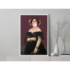 a woman with a bubble gum in her mouth on a shelf next to a vase