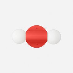 two white and red balls sitting on top of each other in front of a white background