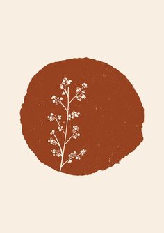 a brown circle with white flowers on it