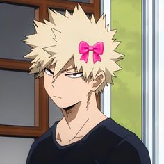 an anime character with blonde hair and pink bows on his head looking at the camera