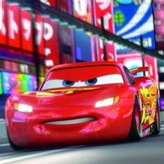 the character cars from disney pixama are driving down the street