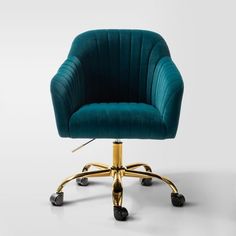 an office chair with wheels and a green velvet upholstered seat, viewed from the front