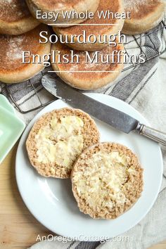 two english muffins on a white plate next to some bagels with the words easy whole wheat sourdough english muffins