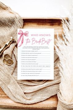 a card that says, who knows the bride's best? with two pairs of scissors next to it