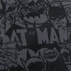 the back of a batman t - shirt with black and white designs