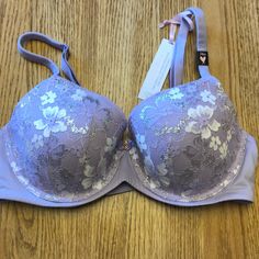 Elegant Purple Bra For Spring, Fitted Lavender Bra For Spring, Fitted Lavender Bra With Padded Cups, Lavender Fitted Push-up Bra, Fitted Lavender Victoria's Secret Bra, Victoria's Secret Fitted Lace Trim Bra, Fitted Purple Bra With Lace Trim, Victoria's Secret Gray Bra, Victoria's Secret Lavender Underwire Bra