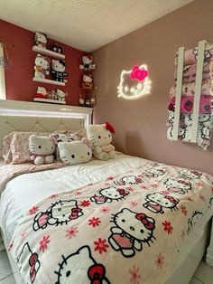 a hello kitty themed bedroom with pink walls and white bedding, decorated with hello kitty decorations