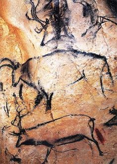 an ancient rock painting with horses and people on it