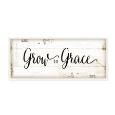 a sign that says grow in grace on the side of a white wooden plank with black lettering