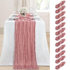 the table is set with pink napkins and place settings for two people to sit at