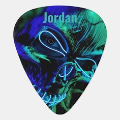 a guitar pick with the name jordan on it in neon blue and green colors, against a white background