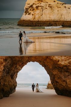 the bride and groom are walking on the beach under an arch in the rock formation