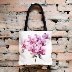 "This Beautiful Watercolor Orchid Tote Bag will make a perfect gift for yourself or any flower lover you know. The vibrant watercolor colors of the flowers make this bag match any outfit for everyday use. Perfect for all ages. It is made from durable lasting materials. - Made with 100% polyester, a medium-weight fabric that is Extremely strong, highly durable, and perfect for everyday use. - All tote bags come with a non-woven laminate inside - Black cotton handles - reinforced second row of sti Botanical Flower Shaped Bags For Daily Use, Botanical Flower-shaped Bag For Daily Use, Botanical Flower-shaped Bags For Daily Use, Gift Multicolor Floral Print Shoulder Bag, Floral Print Flower Shaped Shoulder Bag Gift, White Botanical Rectangular Bag, Pink Flower-shaped Shoulder Bag As A Gift, Pink Flower-shaped Shoulder Bag For Gifts, Pink Flower-shaped Shoulder Bag As Gift