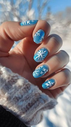 Icy Snowflake Nails, Nail Ideas Snowflake, Snowflake Nail Art Designs, Frozen Theme Nails, Elsa Nails Frozen, Blue Christmas Nail Art, Frozen Nails Disney, Xmas Nails Snowflake, Blue Winter Nails Short