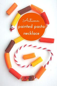 an autumn painted pasta necklace made out of candy sticks and oranges with the words autumn painted pasta necklace on it