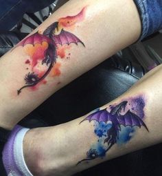 two people with tattoos on their legs, one has a dragon and the other has a flower