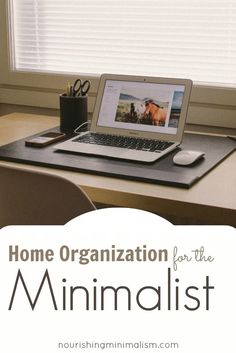 a laptop computer sitting on top of a desk in front of a window with the words home organization for the minimalist