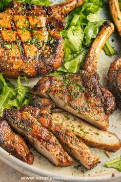 grilled pork chops and greens on a plate