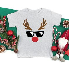 Looking for a cute tee for your kids? We have the perfect Reindeer Boy graphic tee addition to their closet! Kids Tees Design, Kids Christmas Shirts, Kids Christmas T Shirts, Christmas Shirts For Kids, Boy Toddler, Boys Graphic Tee, Kid Tees, Christmas Tshirts, Tee Design