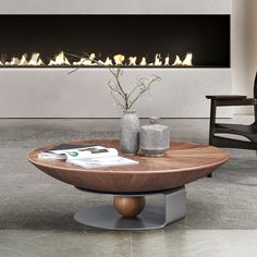 a coffee table with a fire place in the middle