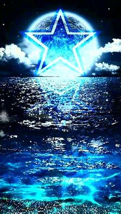 a star is floating on the water in front of some clouds and blue sky with stars