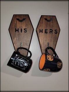 two wooden signs that say his and hers on them, one has a cup in the shape of a bear