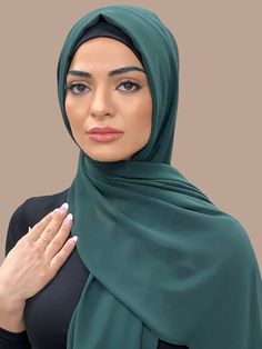 Our Luxury Chiffon hijab-Deep Green is perfect for every occasion. With the softest chiffon fabric we could find, our Luxury Chiffon will become your go to hijab whether you're going out to a fancy party or keeping it casual, looking beautiful is effortless! Fabric: Polyester Chiffon Dimension: 70" x 27" Contour: Long Rectangle Thickness: Light Texture: Smooth Care: Machine or hand wash in warm water, tumble dry or air dry, iron if needed. Elegant Long Solid Color Hijab, Georgette Hijab Colours, Hijab Fabric, Elegant Solid Chiffon Hijab, Chiffon Hijab Colours, Chiffon Hijab Scarfs, Chiffon Hijab, Jersey Hijab, Cream Blouse