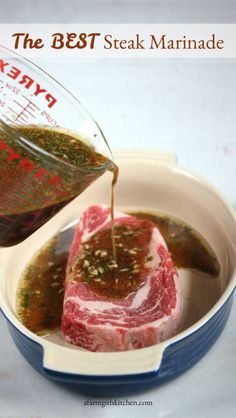 the best steak marinade is being poured into a bowl filled with meat and seasoning