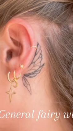 a girl with a small tattoo on her ear and the words general fairy wings written below it