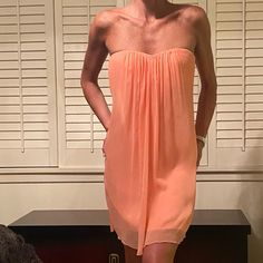 A Gorgeous Pale Coral Strapless Dress. It Has A Sweetheart Bust Line With A Center Draped Pleating That Creates A Flowing Line Down The Middle. Has Boning With An Elastic Bra-Like Closure In The Back With An Exposed Zipper Under The Open Back. Has A More Satiny Lining And It Is Brand New With Tags. Olivia Pink, Exposed Zipper, Back Dress, Alice Olivia, Dress Backs, Open Back, Pink And Orange, Strapless Dress, Coral