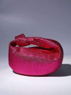 The Ciara Embellished Tote Bag In Hot Pink received a fresh, crystal-embellished update perfect for nights out. It's been made in Italy from hot pink leather and has a softly rounded shape. The top handle is knotted at one side.     Material: PU    25.5 cm / 10 inch diameter (dimensions approx.) Pink Glamour, Club Style, Crystal Embellishment, Top Knot, Pink Leather, Pink Bag, In Hot, Santorini, Trend Setter